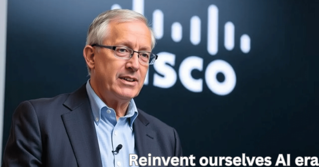 Technology executive speaking at a Cisco event, emphasizing the need to reinvent ourselves in the AI era amid rapid technological change.
