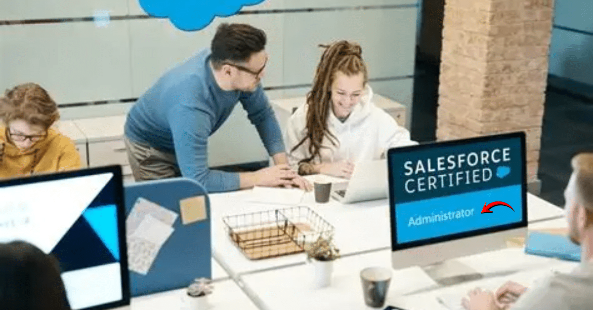 Team members collaborating in a modern office while viewing a screen displaying “Salesforce Certified Administrator,” highlighting AI-enabled digital skills.