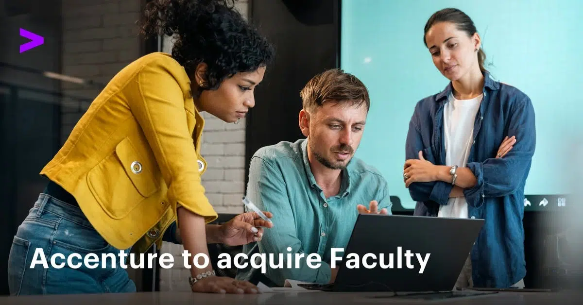 Accenture team collaborating around a laptop during a strategy meeting, illustrating Accenture’s acquisition of Faculty to strengthen AI leadership and data science capabilities.