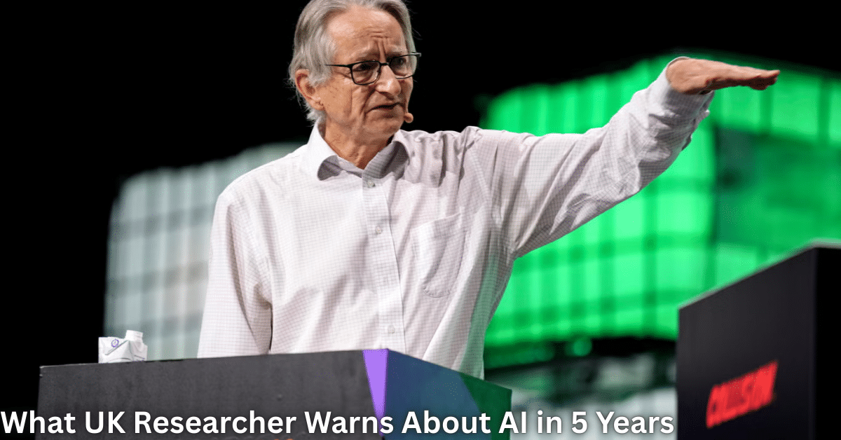 UK AI researcher speaking at a conference, gesturing with one hand while standing at a podium against a green digital backdrop.
