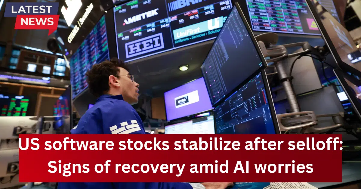 Latest news image showing a stock trader on a U.S. exchange floor monitoring multiple screens, with a headline about U.S. software stocks stabilizing after a selloff amid AI concerns.